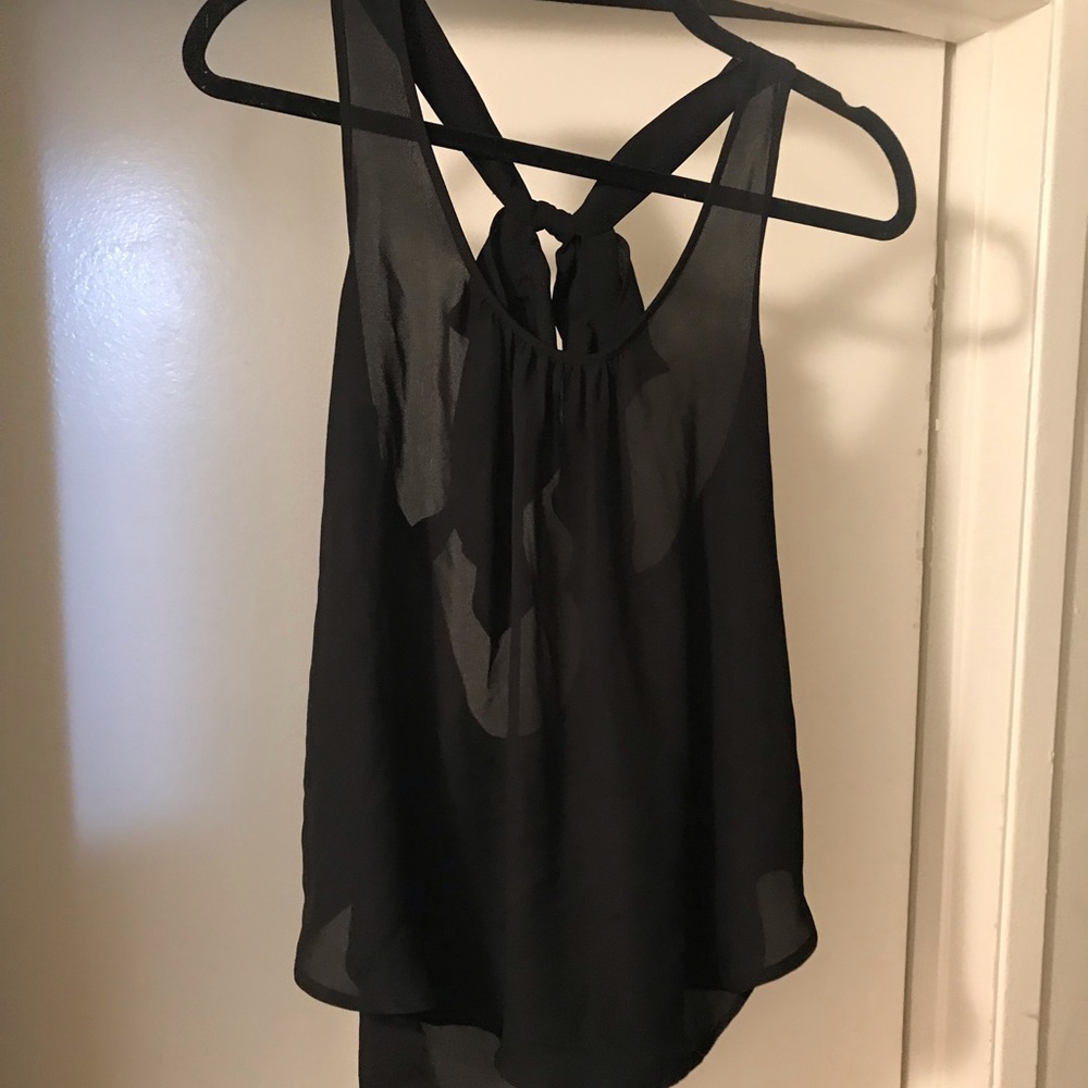 Cute black blouse with a bow on the back
